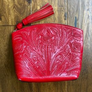 Carolina Crowley red clutch bag Mexican tooled leather tassel